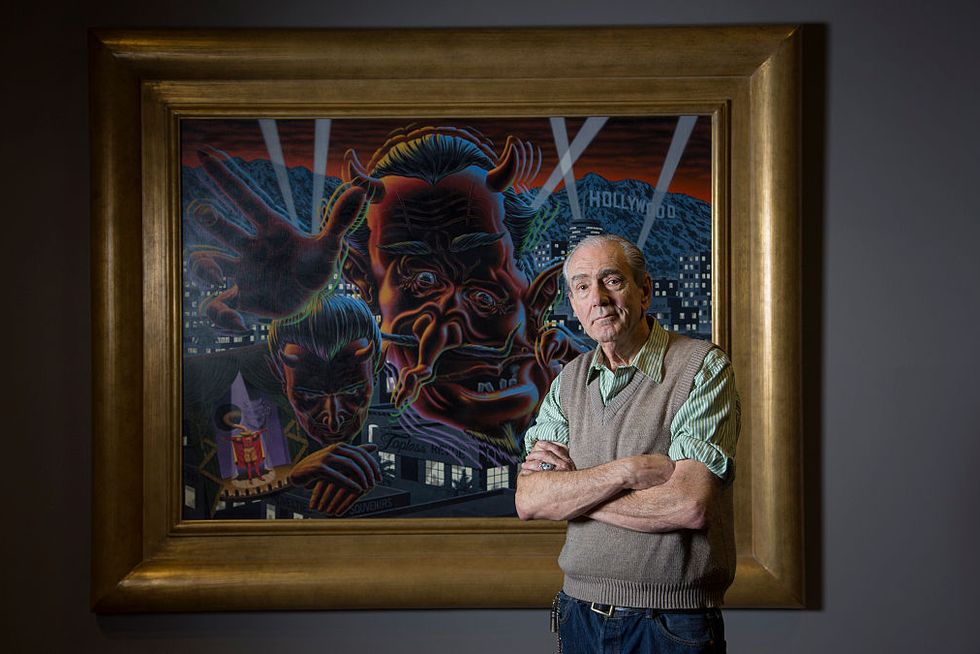 LOS ANGELES, CA - FEBRUARY 18, 2015: Robert Williams, the pop surrealist painter, and founder of Jux los angeles, ca february 18, 2015 robert williams, the pop surrealist painter, and founder of juxtapoz magazine, is photographed in front of his painting, hollywood after midnight, part of his show at the la municipal art gallery in hollywood photo by katie falkenberglos angeles times via getty images