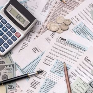 Tax forms and a calculator